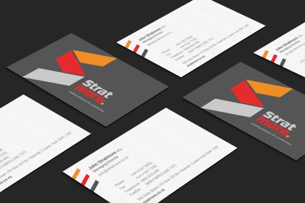 Close up business cards showing a new brand and logo design by Wonderlab.