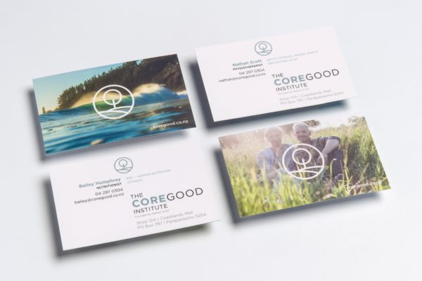 Four business cards with the word comegood on them.