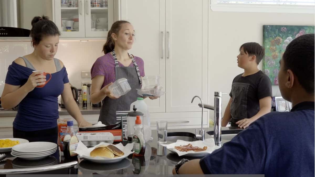 Video still of people in the kitchen, part of a environmental campaign produced by Wonderlab