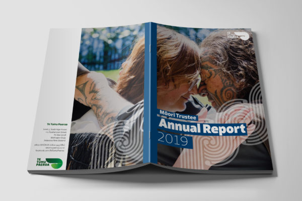 An annual report with a picture of a woman and a man.