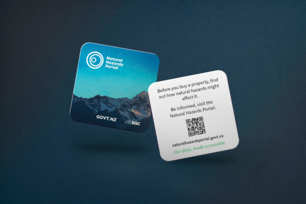 A business card with a mountain image on it.