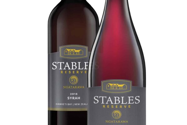 Two bottles of stables wine on a white background.
